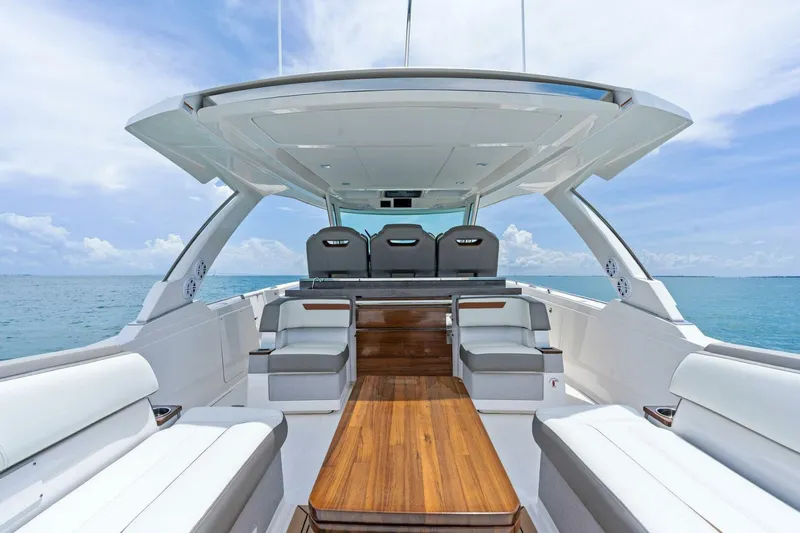  Yacht Photos Pics 2023 Tiara Yachts 38 LS luxury boat interior with seating and ocean view.