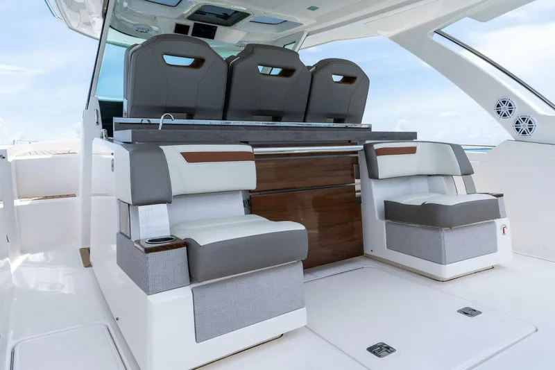  Yacht Photos Pics 2023 Tiara Yachts 38 LS interior with luxurious seating and modern design.