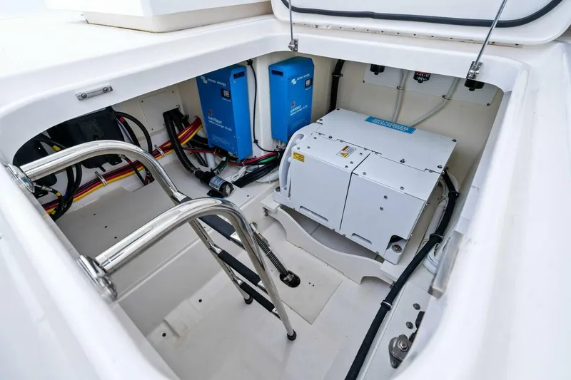  Yacht Photos Pics 2023 Tiara Yachts 38 LS engine compartment with electrical components and wiring.