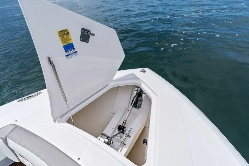  Yacht Photos Pics Open anchor compartment on 2023 Tiara Yachts 38 LS, with ocean background.