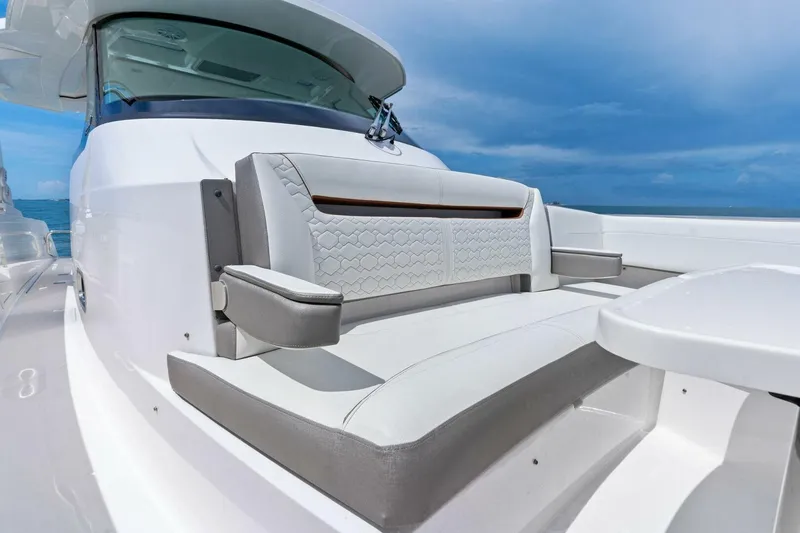  Yacht Photos Pics 2023 Tiara Yachts 38 LS luxury seating with ocean backdrop.