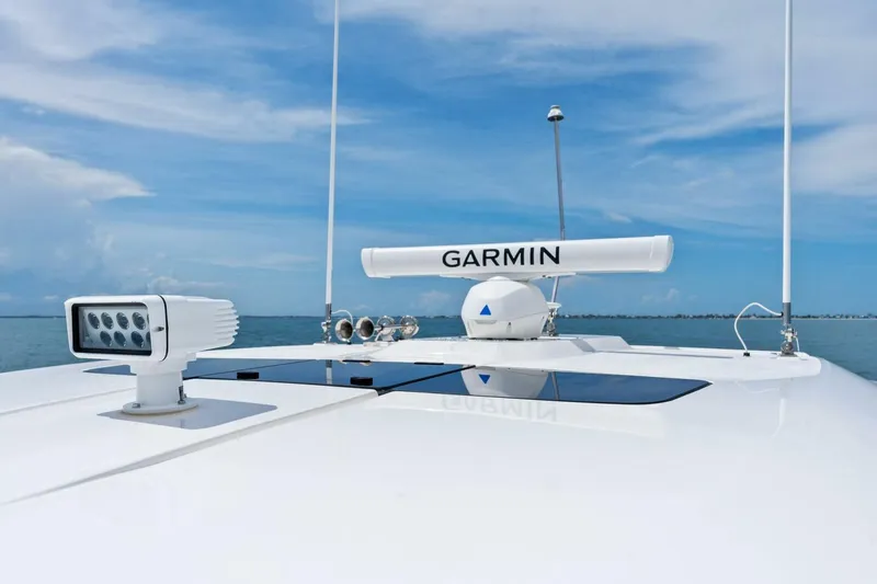  Yacht Photos Pics 2023 Tiara Yachts 38 LS with Garmin radar on a sunny day.