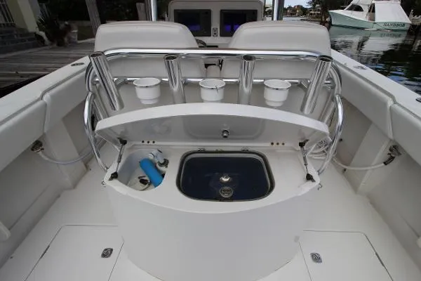Every Effort Yacht Photos Pics 2008 Jupiter 34 FS boat interior with fishing rod holders and livewell.