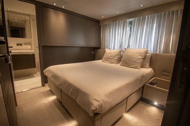  Yacht Photos Pics Luxurious bedroom interior of 2016 Sanlorenzo SL96 yacht with modern design and ambient lighting.