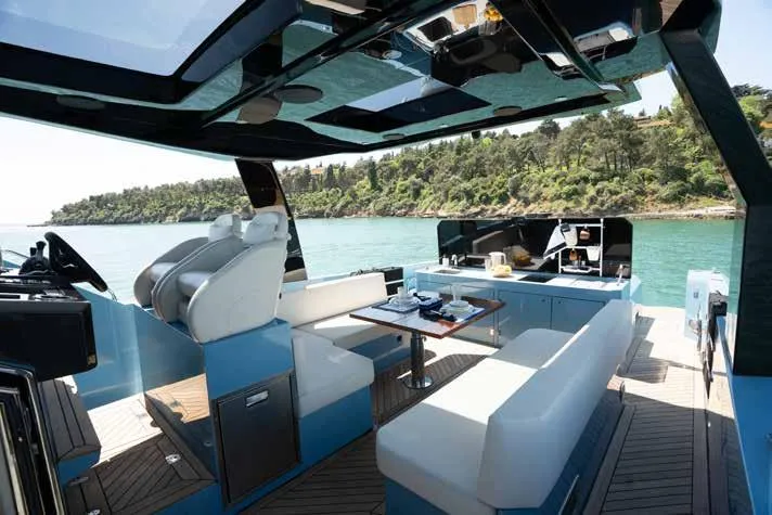 Therapy 1 Yacht Photos Pics Luxurious 2024 Fabbro F45 yacht interior with modern seating and dining area.