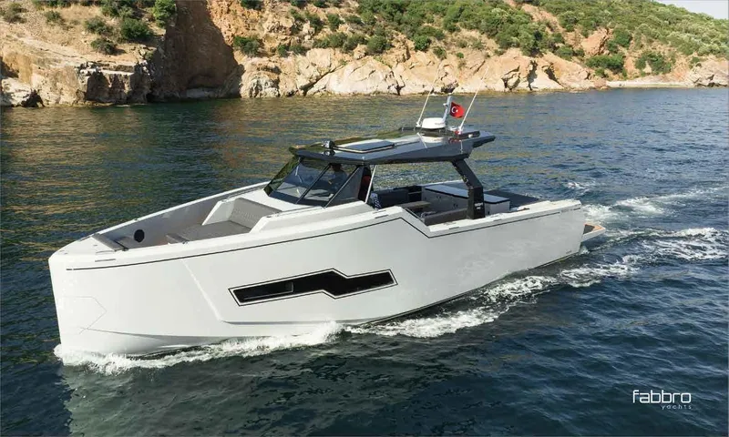 Therapy 1 Yacht Photos Pics 2024 Fabbro F45 yacht cruising near rocky coastline.