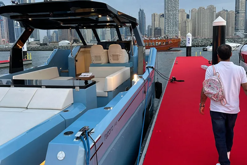 Therapy 1 Yacht Photos Pics 2024 Fabbro F45 yacht docked with city skyline in background.