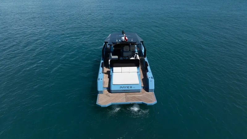 Therapy 1 Yacht Photos Pics 2024 Fabbro F45 boat cruising on open water, rear view.