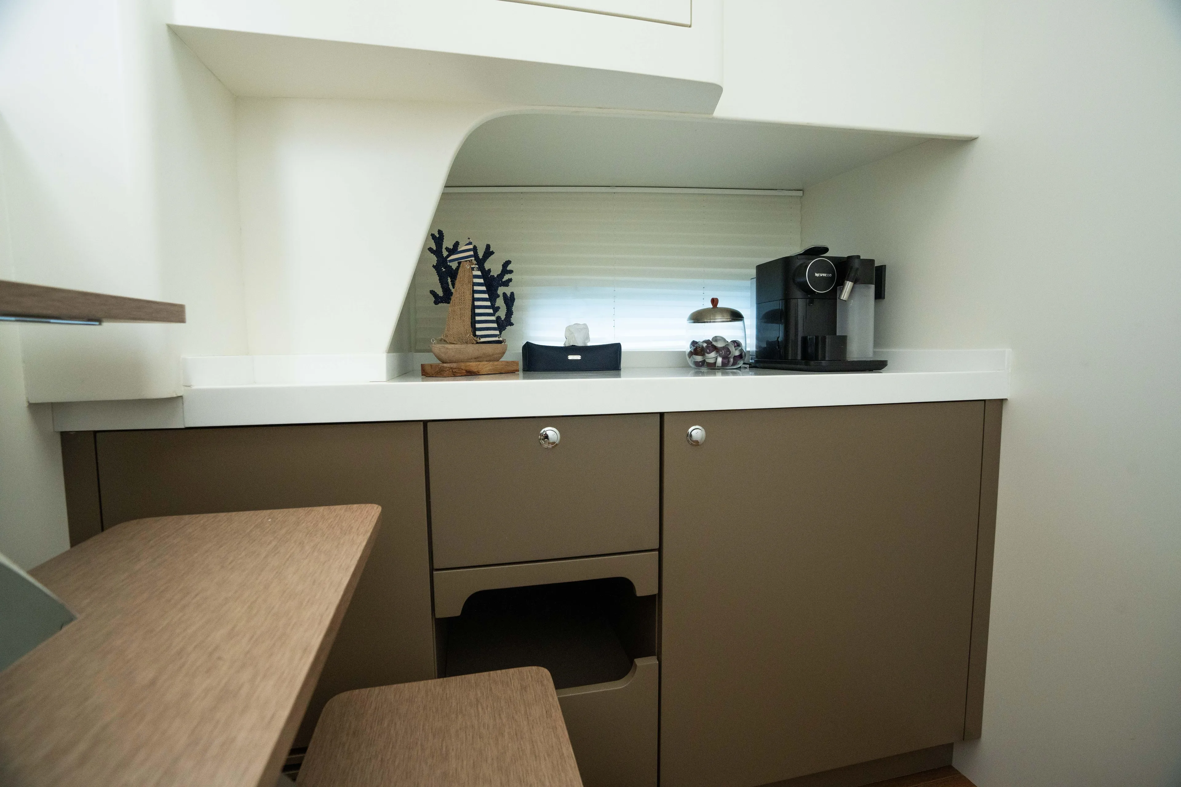 Therapy 1 Yacht Photos Pics Modern kitchen area in 2024 Fabbro F45 with coffee maker and stylish decor.