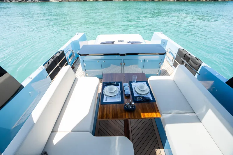 Therapy 1 Yacht Photos Pics Luxury Fabbro F45 yacht interior with elegant dining setup, 2024 model.