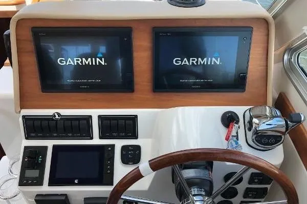  Yacht Photos Pics Helm of 2018 Back Cove Downeast 37 with dual Garmin displays and controls.