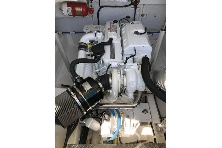  Yacht Photos Pics Engine room of 2018 Back Cove Downeast 37 with visible components and fire extinguisher.
