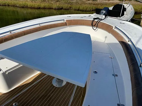  Yacht Photos Pics 2016 Buddy Davis 28 Center Console boat with spacious deck and seating area.