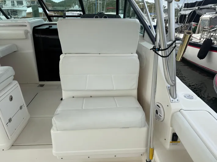 Awol Yacht Photos Pics White seating on 2003 Tiara Yachts 3100 Open LE, docked in marina.