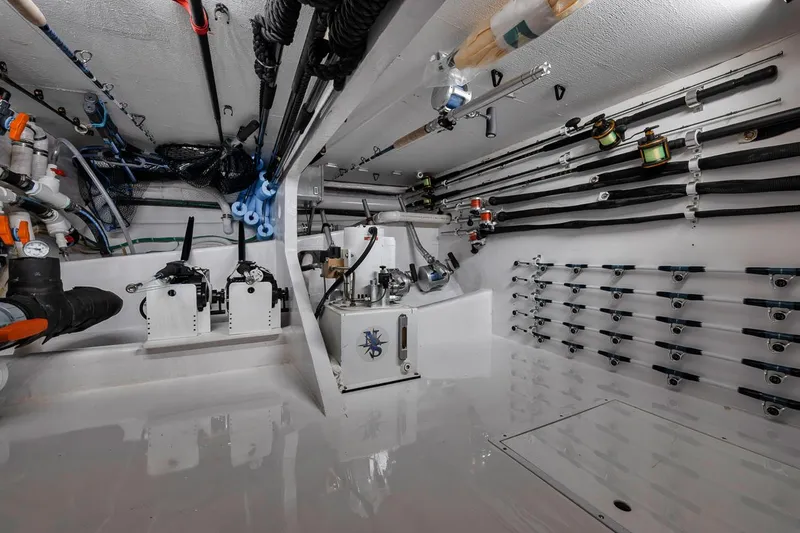 High Cotton Yacht Photos Pics 2015 Viking 92 EB HIGH COTTON- Rod Storage