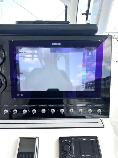  Yacht Photos Pics 2022 Sea Pro 320 DLX Center Console dashboard with Simrad display and controls.