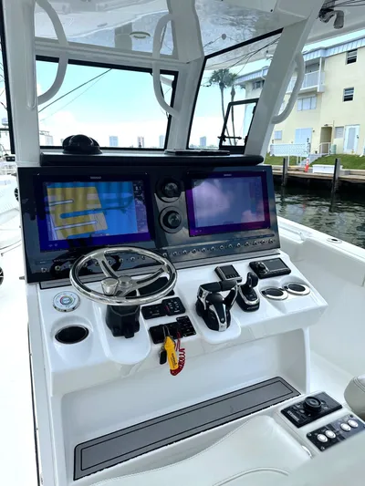  Yacht Photos Pics 2022 Sea Pro 320 DLX Center Console with advanced navigation and control systems.