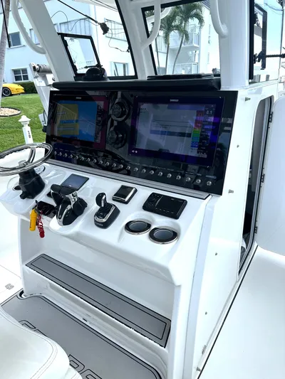  Yacht Photos Pics 2022 Sea Pro 320 DLX Center Console with advanced navigation and control systems.
