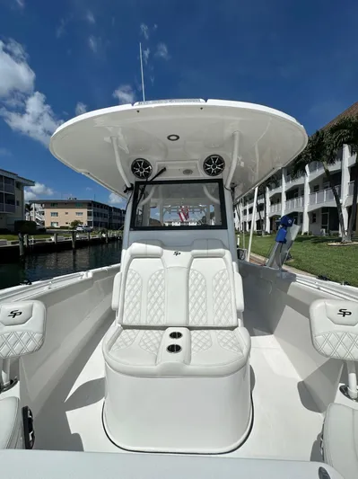  Yacht Photos Pics 2022 Sea Pro 320 DLX Center Console boat with luxurious seating and modern design.