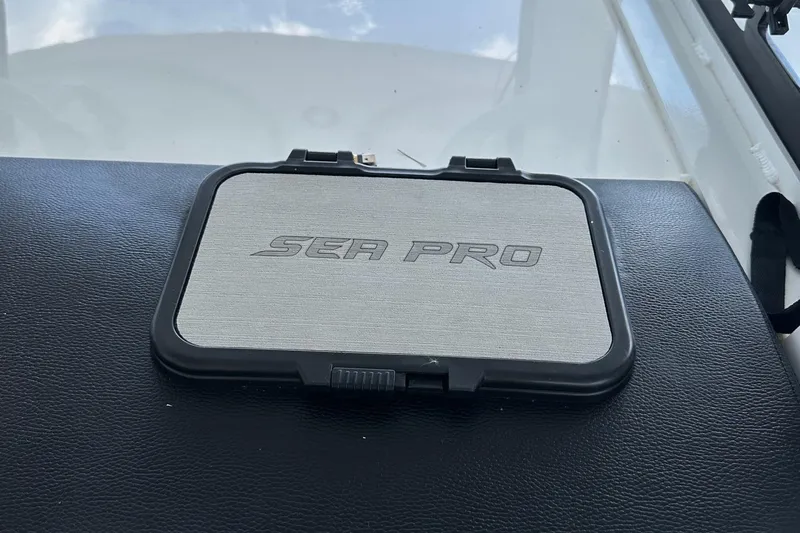  Yacht Photos Pics 2022 Sea Pro 320 DLX Center Console logo on dashboard.