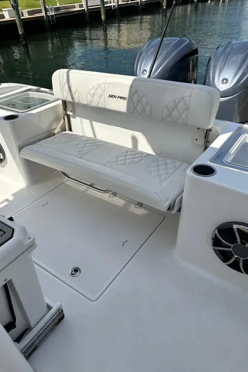  Yacht Photos Pics 2022 Sea Pro 320 DLX Center Console boat with cushioned seating and dual engines.