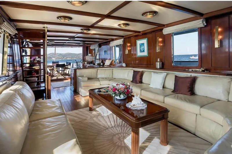 Le Kir Royal Yacht Photos Pics Luxurious 1966 Full Displacement Motor Yacht interior with elegant seating and ocean view.