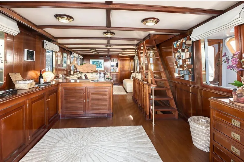 Le Kir Royal Yacht Photos Pics Luxurious 1966 Full Displacement Motor Yacht interior with elegant wood paneling and modern decor.