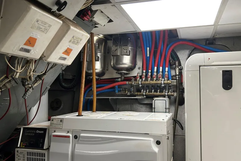 Le Kir Royal Yacht Photos Pics Engine room of a 1966 Full Displacement Motor Yacht with generator and piping system.