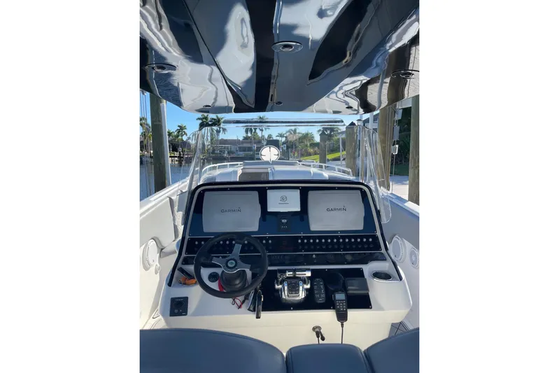 Roweboat Yacht Photos Pics Helm of 2010 Concept 4400 Sport Yacht with Garmin navigation system.