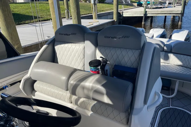 Roweboat Yacht Photos Pics Luxury seating on 2010 Concept 4400 Sport Yacht, featuring elegant diamond-stitched upholstery.