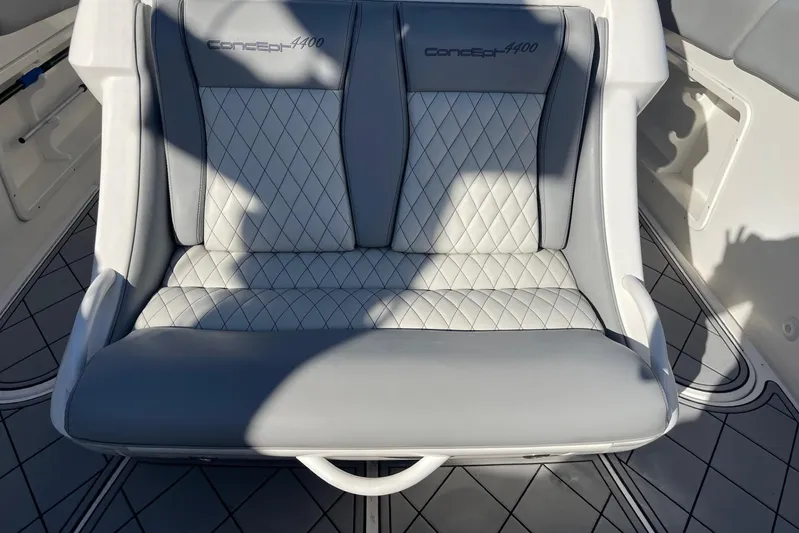 Roweboat Yacht Photos Pics Luxurious seating on 2010 Concept 4400 Sport Yacht with quilted upholstery design.