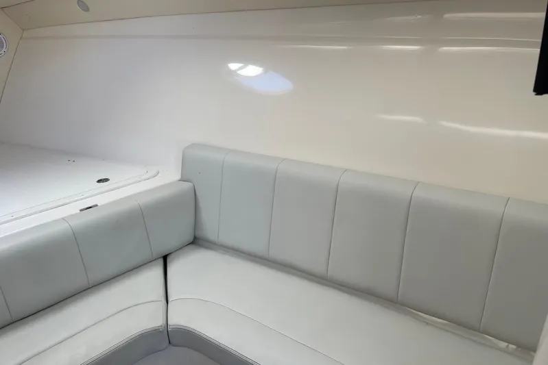 Roweboat Yacht Photos Pics Interior of 2010 Concept 4400 Sport Yacht with sleek white seating.