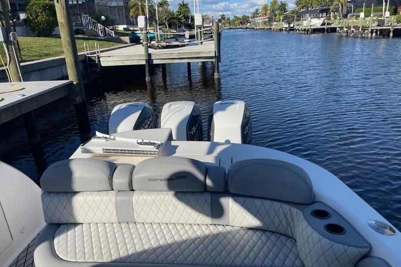 Roweboat Yacht Photos Pics Luxury Concept 4400 Sport Yacht, 2010 model, docked with triple outboard engines.