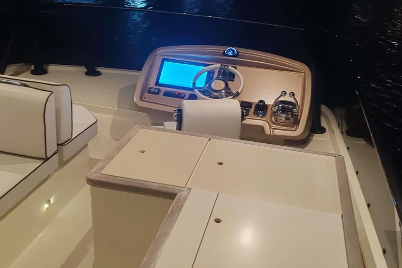  Yacht Photos Pics 2015 Beneteau Monte Carlo 6 helm with modern controls and seating.