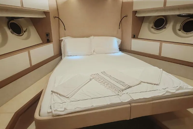  Yacht Photos Pics Luxurious bedroom interior of 2015 Beneteau Monte Carlo 6 yacht with elegant bedding.