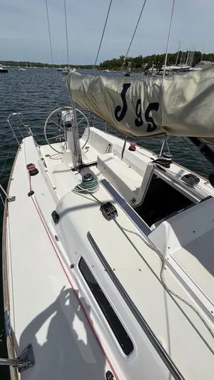 Seabird Yacht Photos Pics 2012 J Boats J/95 sailboat on water, showcasing deck and sail details.