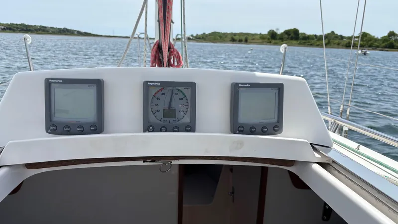 Seabird Yacht Photos Pics Cockpit of 2012 J Boats J/95 sailboat with navigation instruments on display.