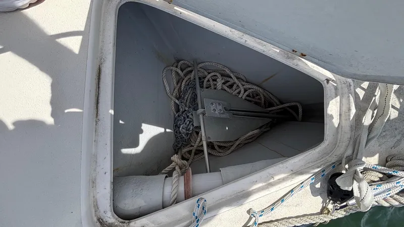 Seabird Yacht Photos Pics Anchor locker of a 2012 J Boats J/95 sailboat with ropes and chains.