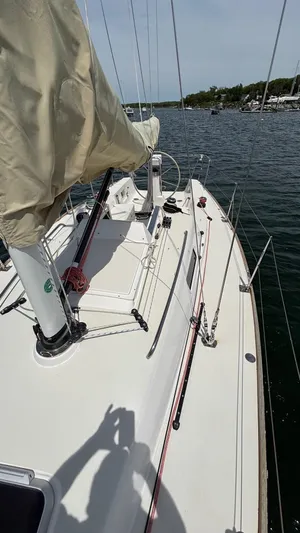 Seabird Yacht Photos Pics 2012 J Boats J/95 sailboat deck view on calm water.