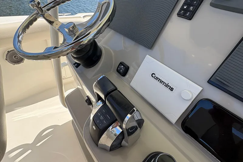  Yacht Photos Pics Steering console of 2017 Boston Whaler 330 Outrage with Cummins controls.