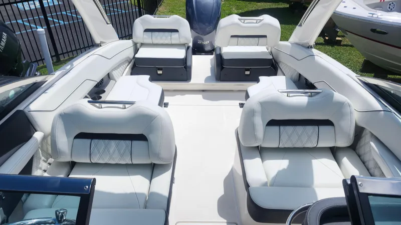  Yacht Photos Pics 2026 Regal LX4 boat interior with luxurious white seating and modern design.