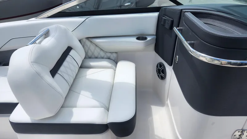  Yacht Photos Pics Luxurious white seating in a 2026 Regal LX4 boat interior.