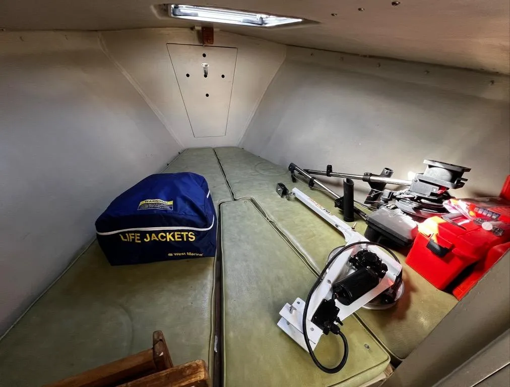 1974 Dyer 29' Sport Fisher cabin with life jackets and equipment storage.