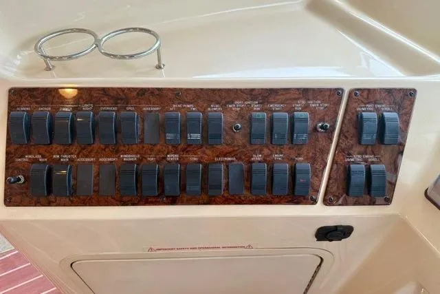  Yacht Photos Pics Control panel of 2001 Sea Ray 540 Cockpit Motor Yacht with labeled switches.