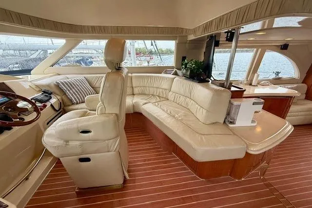  Yacht Photos Pics Luxurious interior of 2001 Sea Ray 540 Cockpit Motor Yacht with leather seating.