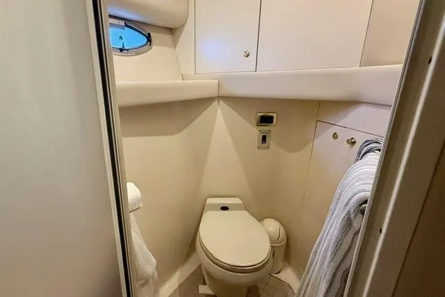  Yacht Photos Pics 2001 Sea Ray 540 Cockpit Motor Yacht bathroom with compact design and modern fixtures.