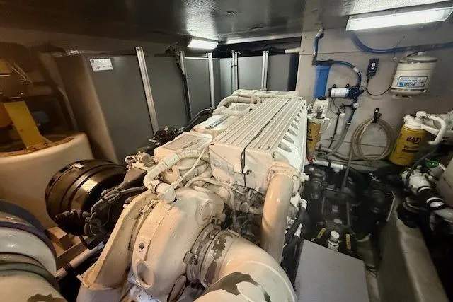  Yacht Photos Pics Engine room of 2001 Sea Ray 540 Cockpit Motor Yacht, showcasing machinery and components.