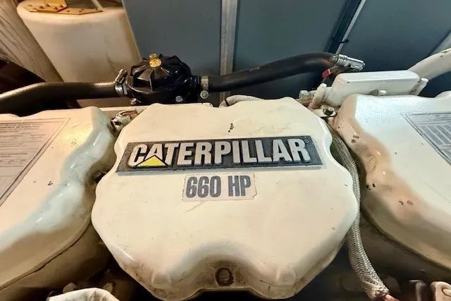  Yacht Photos Pics Caterpillar 660 HP engine in 2001 Sea Ray 540 Cockpit Motor Yacht.
