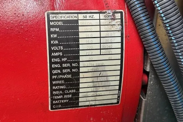  Yacht Photos Pics Specification label on a red engine, Sea Ray 540 Cockpit Motor Yacht, 2001 model.