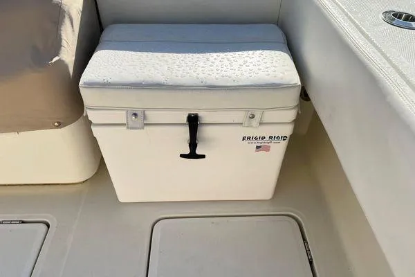 Gyn Tonic Yacht Photos Pics White cooler on 2018 Hydra-Sports 3000 CC boat deck, featuring Frigid Rigid branding.